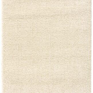 Vit plysch ryamatta med extra tjocklek i ett vardagsrum