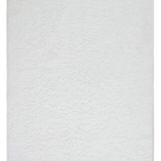 Mjukt offwhite ryamatta i teddy-material med tjock lugg i modern inredningsmiljö