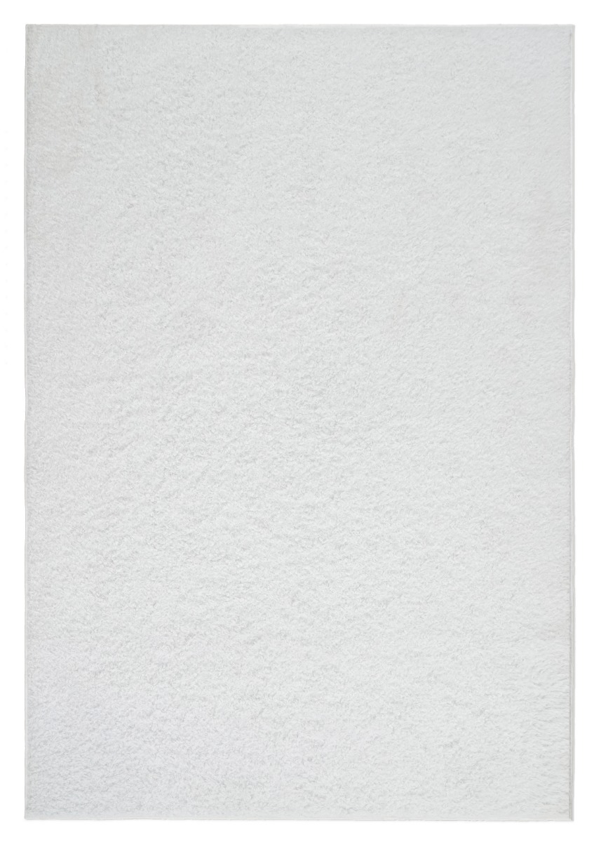 Mjukt offwhite ryamatta i teddy-material med tjock lugg i modern inredningsmiljö