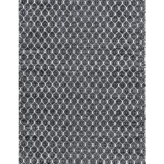 Svart handvävd plastmatta Mimmi Sian med inverterat mönster och tjocklek cirka 7 mm