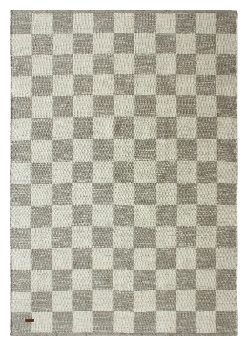 Grå ullmatta Webster med kortskuren yta och rutigt mönster i modern inredning