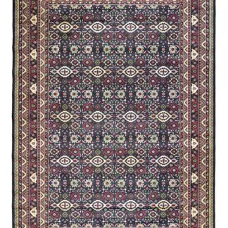 Howwe Wiltonmatta i antracitgrå färg med mjuk textur i ett modernt vardagsrum