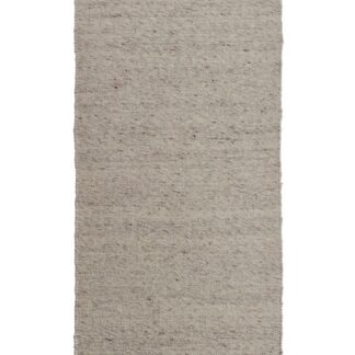 Otelia ljusgrå ullmatta med mjuk textur och elegant design läggd i vardagsrum