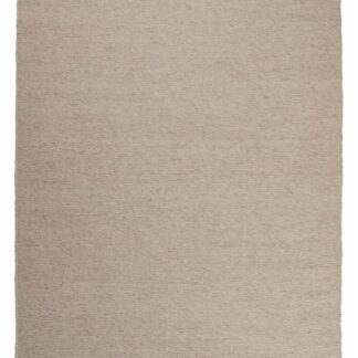 Beige ullmatta Otelia med mjuk och tjock yta liggande på golv i inbjudande rum