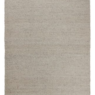 Ljusgrå mjuk ullmatta Otelia med ullunderlag i ett modernt hemmiljö