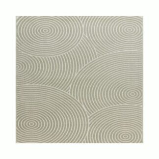 Grön Santos matta i polypropylen med subtilt grafiskt mönster placerad på golv inom- och utomhusmiljö