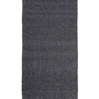 Otelia antracit färgad mjuk ullmatta med 10 mm tjocklek och ullunderlag i modern heminredning